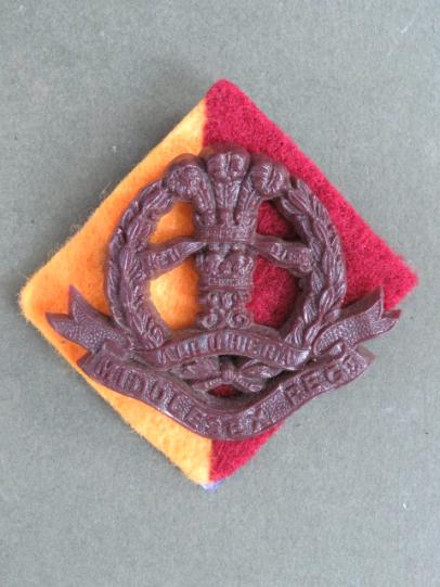 British Army WW2 Plastic Middlesex Regiment Cap Badge